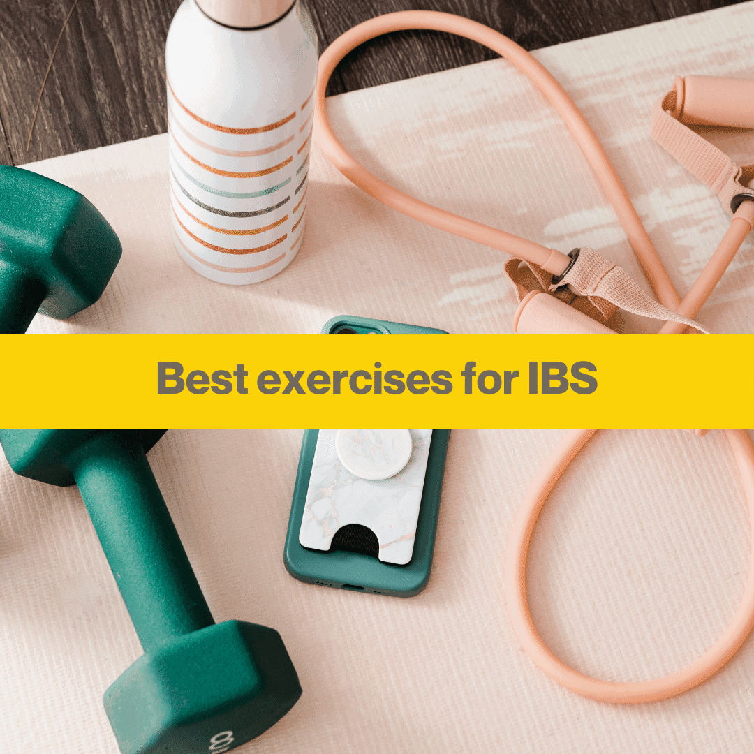 dark green hand weights, pink skipping rope, water bottle and phone on light pink background