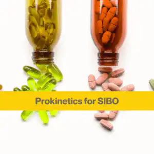 white background, two bottles lying down with pills spilling out of them from top of the shot, one bottle is green with green capsules, and one is red with red pills. Yellow banner with the words Prokinetics for SIBO in brown