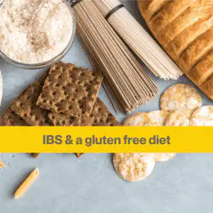 gluten free diet for IBS (2) Some dark brown crackers, a bundle of spaghetti, bread and some crackers flat lay photo on a light blue background.