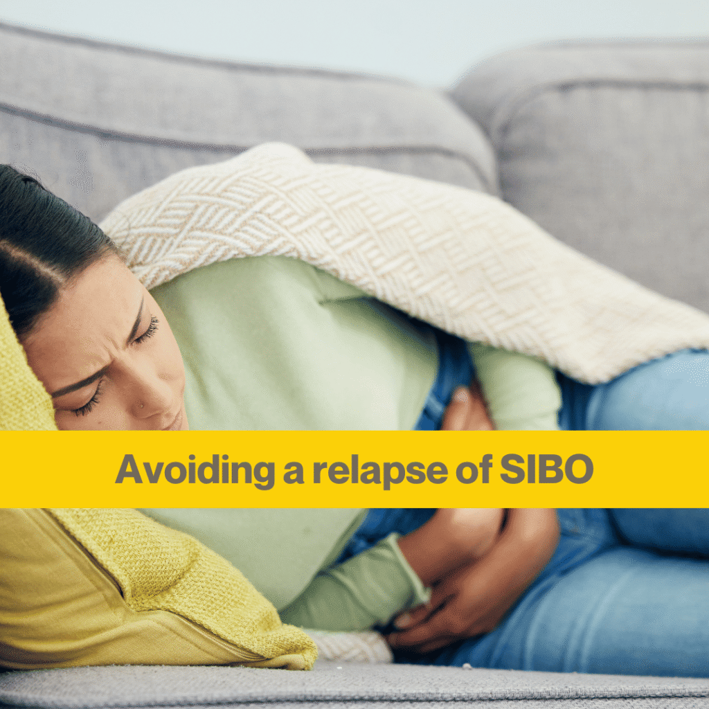 Why SIBO keeps coming back: root causes of SIBO relapse 1 woman lying on a grey sofa with a cardigan draped round her shoulders. Words Avoiding a relapse of SIBO