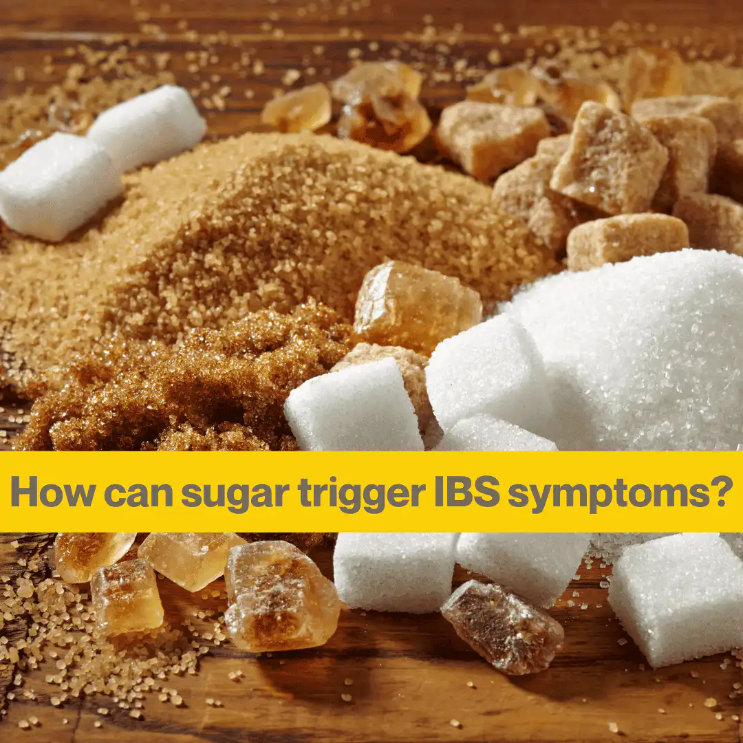 is sugar intolerance causing your IBS (1) Wooden table with a heap of brown and white sugar, and some white sugar cubes