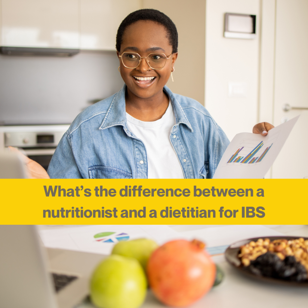 Nutritionist vs dietitian for IBS: what's the difference? 1 Woman wearing glasses, a blue shirt and white t shirt looking at some charts. She is sitting at a table showing some graphs printed out. Close up of nuts on the table. Words What the difference between a nutritionist and dietitian for IBS